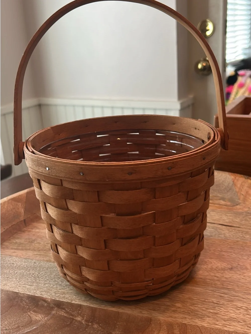 Longaberger Basket with Handle has liner 6 1/2 in tall without handle by 8 in